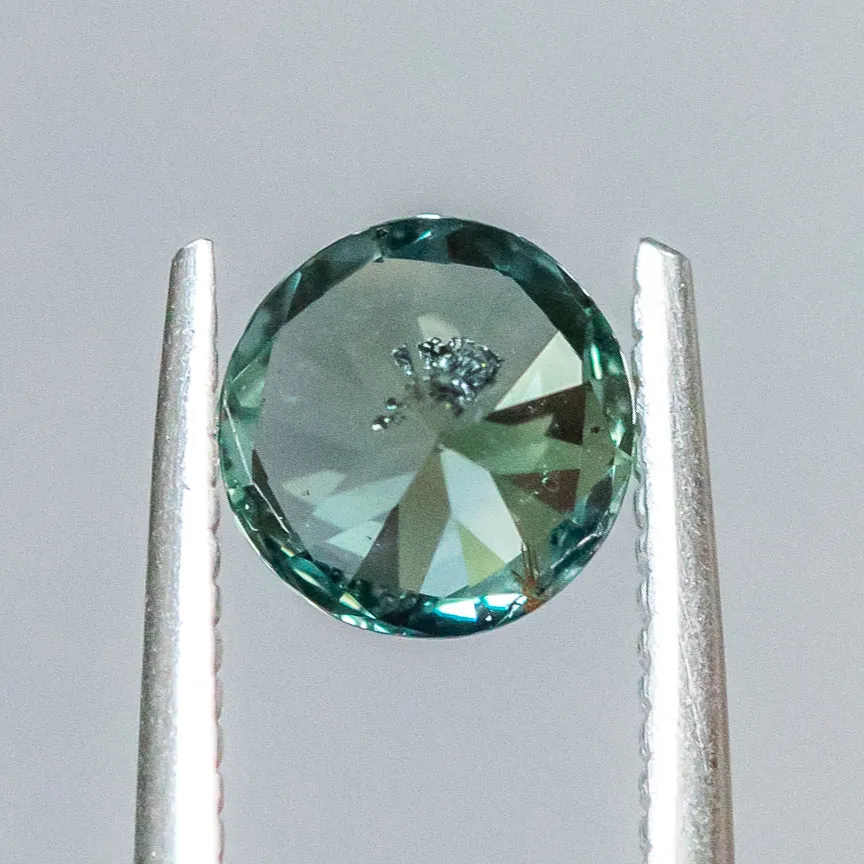 1.46CT ROUND TANZANIAN SAPPHIRE, TEAL GREEN, 6.65X6.65X4.10MM, UNTREATED