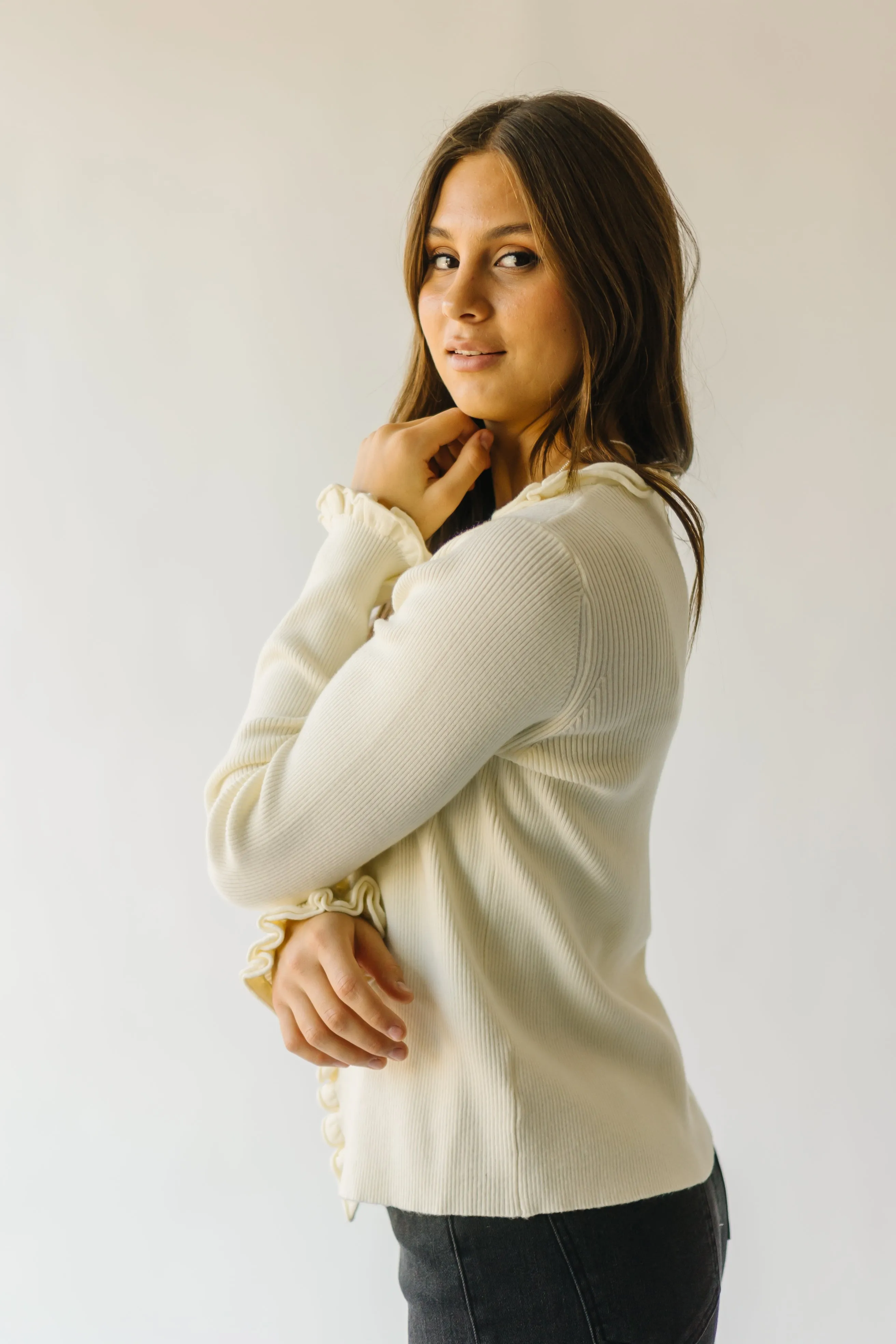 The Sagola Frill Hem Cardigan in Cream